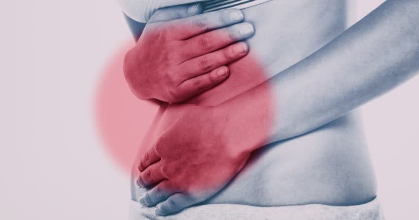 Immagine suggestiva di dolore addominale con area rossa a coprire stomaco e intestino