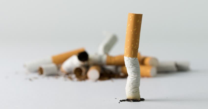 Gruppo di sigarette ad indicare decisione di smettere di fumare
