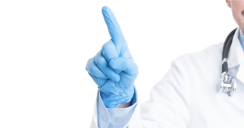 esame della prostata-close up dito indice con guanto medico